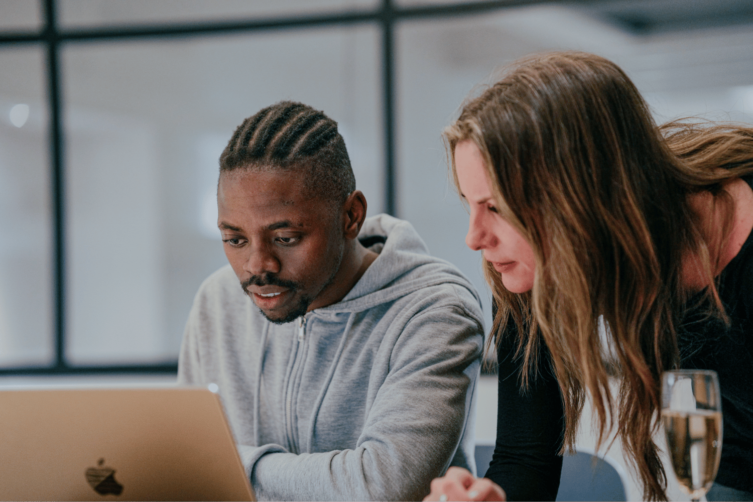 two people looking at a computer screen